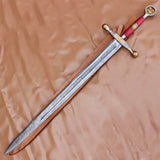 40 inch custom hand forged Damascus steel football themed sword with rat tail tang and genuine leather sheath.